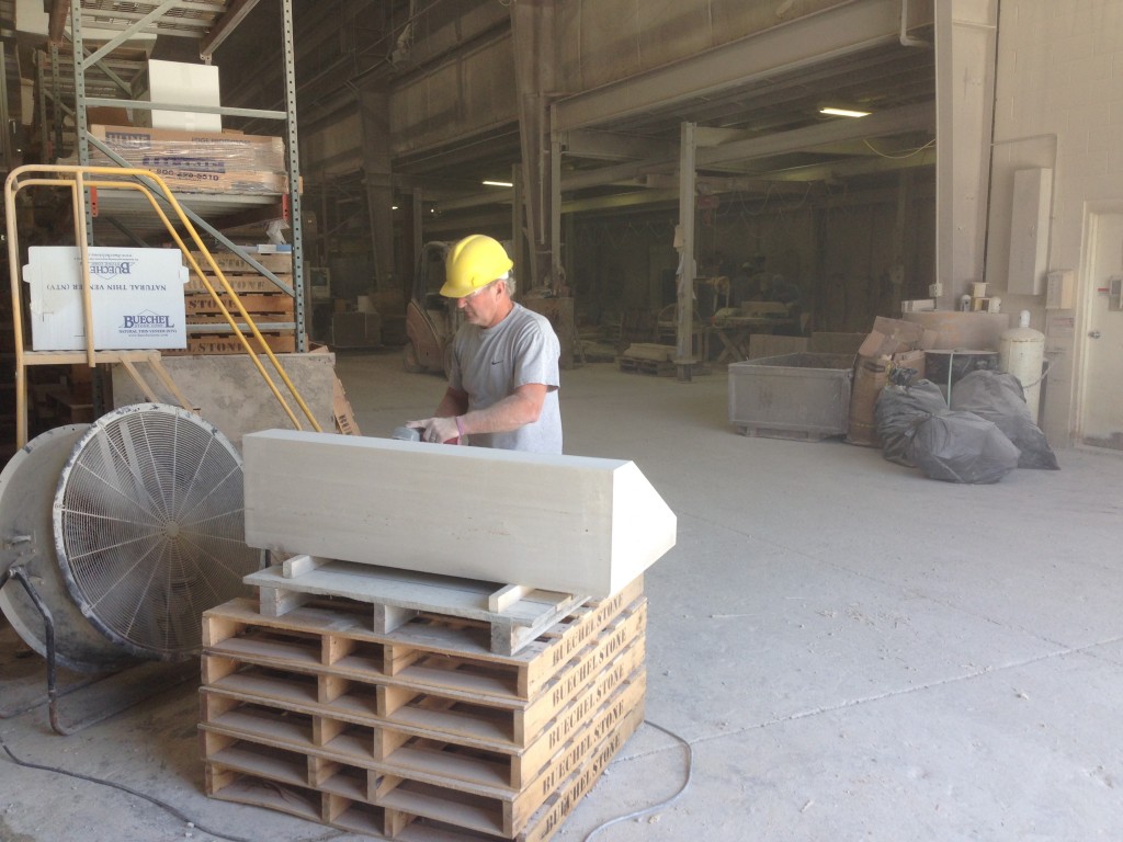 Tim sanding one of the base stones