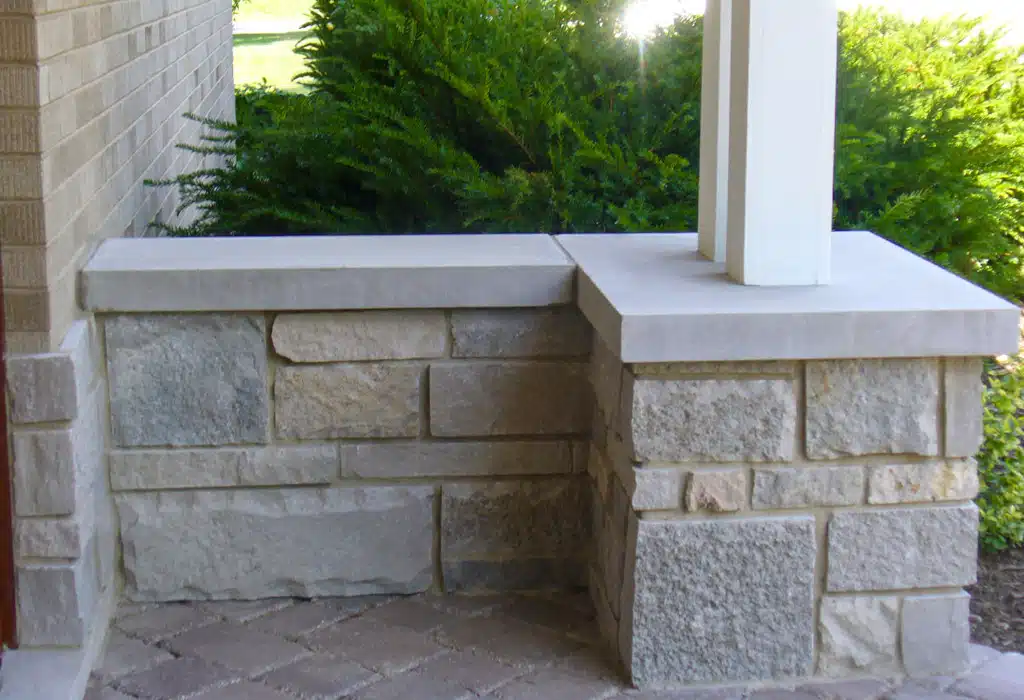 Picture of a good stone veneer wall installation, a front porch wall and column