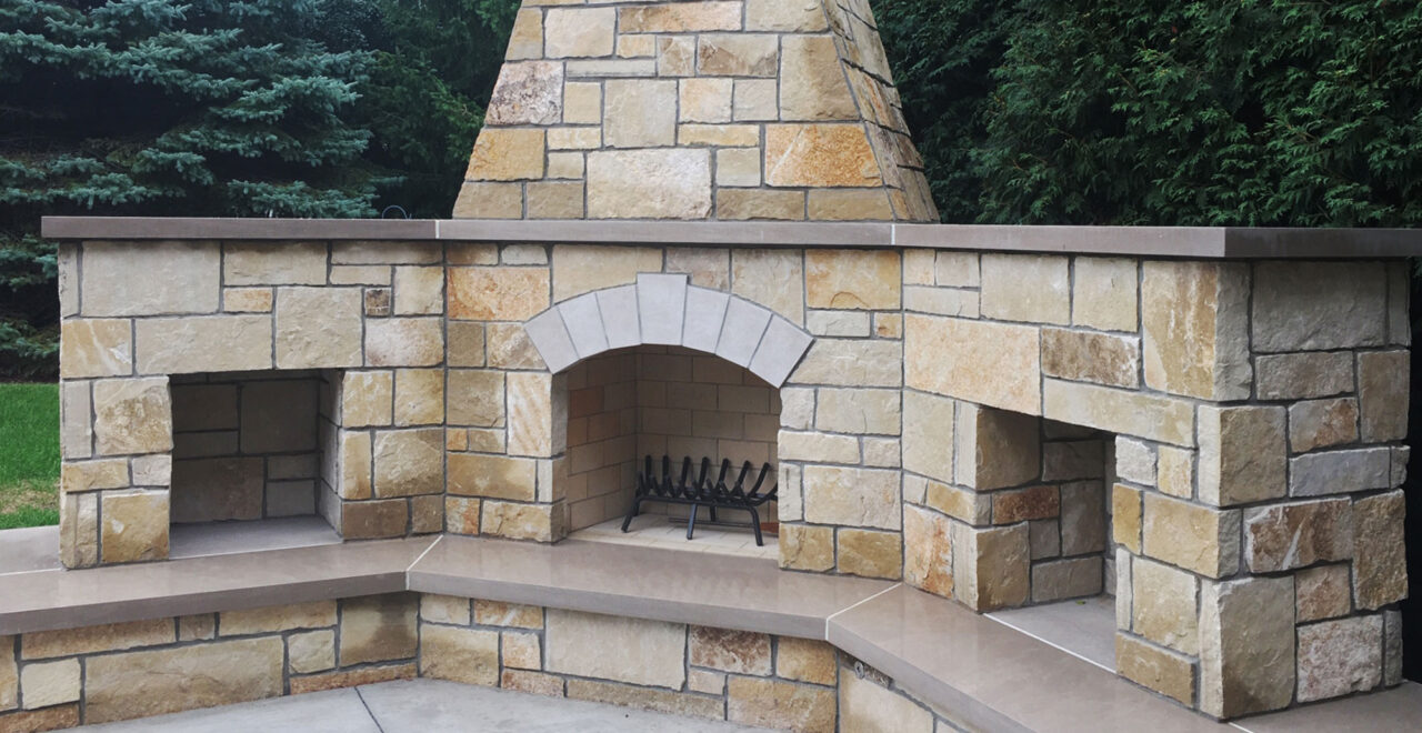 https://buechelstone.com/wp-content/uploads/2020/11/Jute-Cloth-Castle-Rock-Modern-rustic-castle-stone-patio-landscape-outdoor-fireplace-stone-veneers-luxury-stone-home-design-HERO-02cc-e1631287719288.jpg