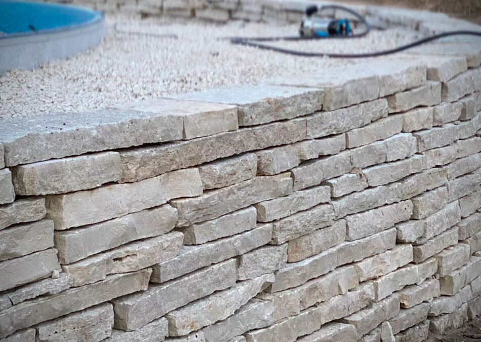 Backyard landscaping | How to build a dry stacked stone retaining wall